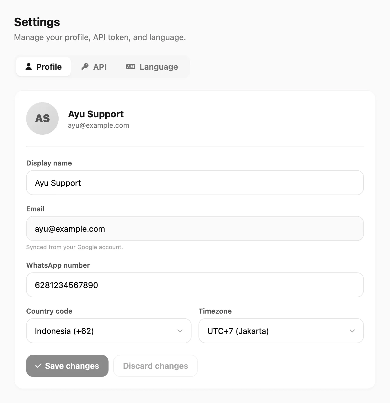 Account Settings — tab Profile dengan nama, email, nomor WhatsApp, country code, dan timezone